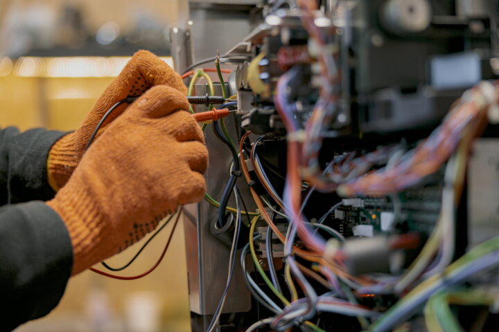 A local electrician in Pontefract working on the electrical system in a house, who has been chosen for its reliability.